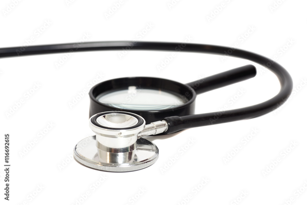 Magnifying Glass With Stethoscope isolated on white.Health conce Magnifying Glass With Stethoscope isolated on white.Health conce