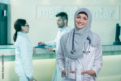Closeup portrait of friendly, smiling confident muslim female doctor.