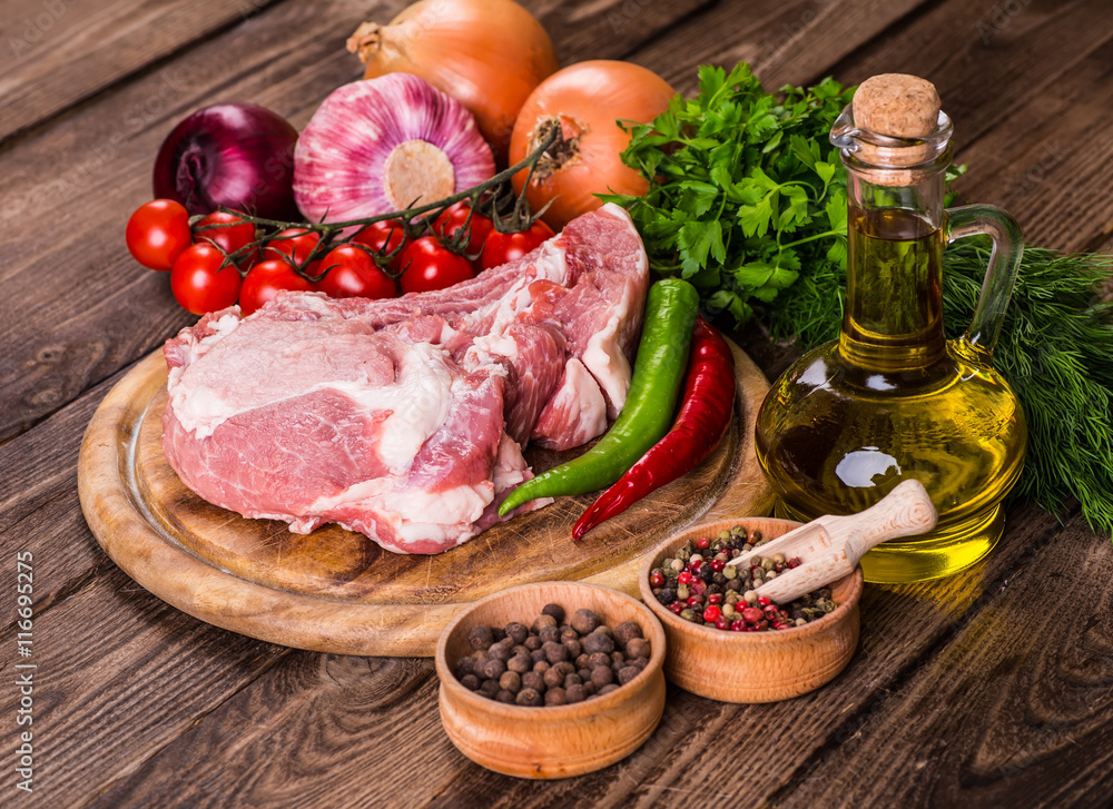 Raw marbled meat steak Ribeye on dark wooden background Raw marbled meat steak Ribeye on dark wooden background