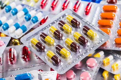 Colorful of oral medications on White Background.