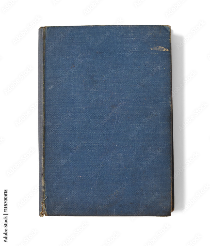 A single old hardback book with a blue cover isolated on a white background A single old hardback book with a blue cover isolated on a white background