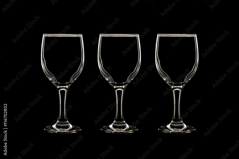 Empty three wine glass on black background Empty three wine glass on black background