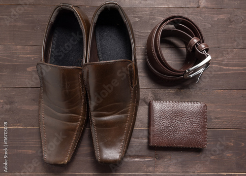 elegant set: brown wallet, brown men's shoes, brown leather belt