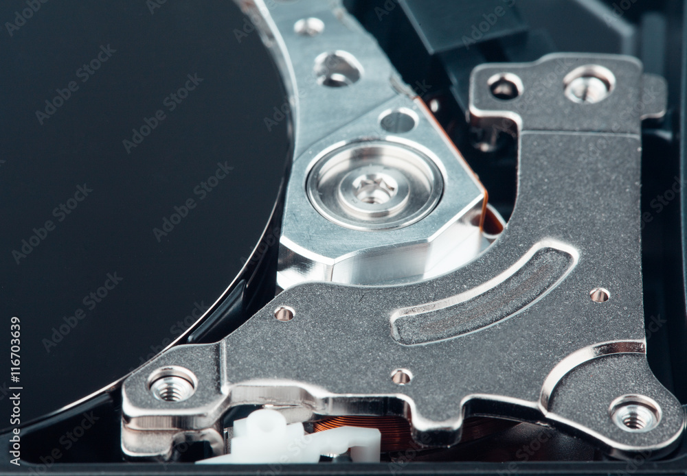 real open computer hard drive on a blue background real open computer hard drive on a blue background