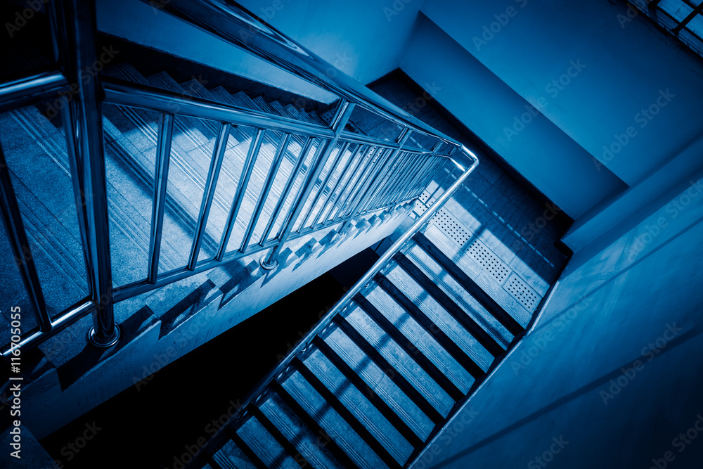 Fototapeta premium stairs in office building,blue toned image,spiritual concept.