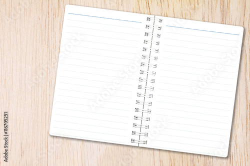 Open notebook paper with line on nature wood background for design with copy space for text or image.