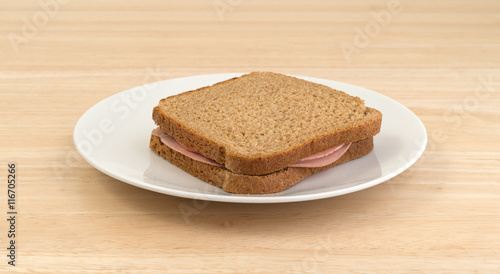 Mortadella sandwich on wheat bread.