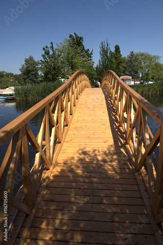 wooden footbridge across the lake © karitap