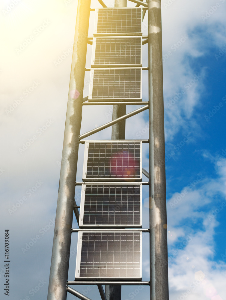 Vertical solar panels over blue sky. Vertical solar panels over blue sky.