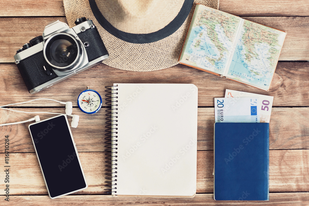 Kindercentrum over Verbeelding Accessories for travel. Passport, photo camera, smart phone, notebook and  travel map. Top view. Travel concept Stock Photo | Adobe Stock