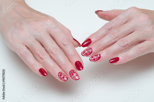 long oval nails with maroon mesh butterfly and crystals
