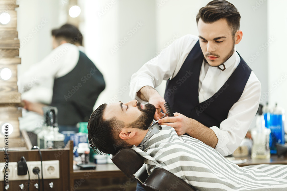 Barber making a beard