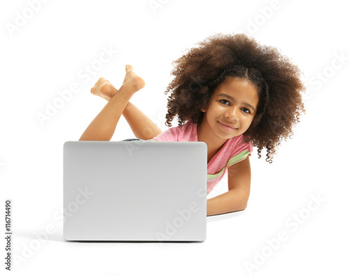 Happy African girl with lap...