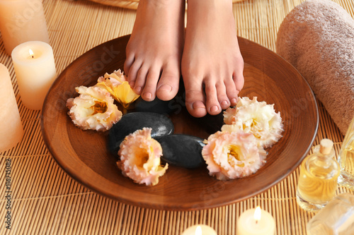 Female feet treatment. Spa concept