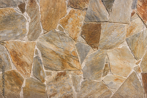 masonry slate facade wall background with cement joints antique