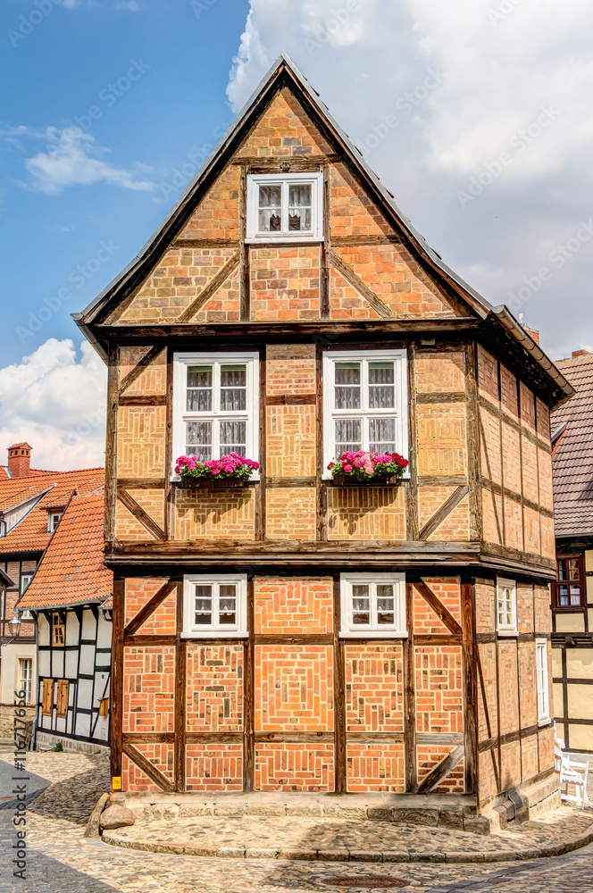 Alte, traditionelle Fachwerkhäuser in der Welterbestadt Quedlinburg im Harz Alte, traditionelle Fachwerkhäuser in der Welterbestadt Quedlinburg im Harz