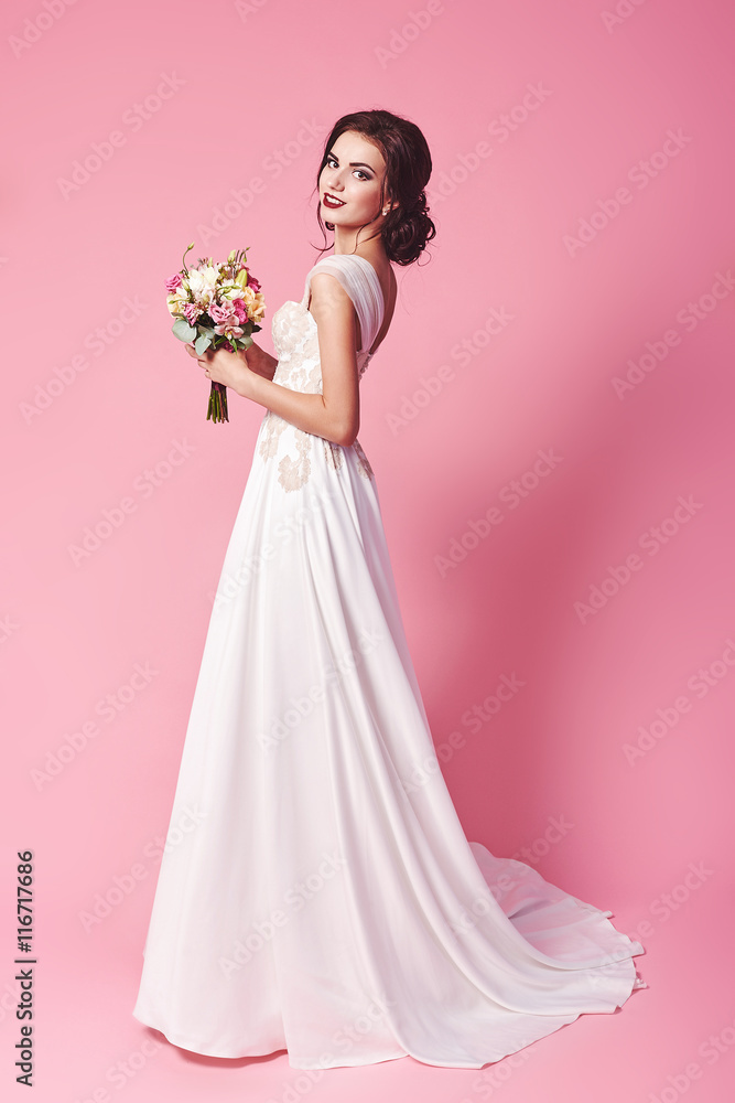 Beautiful bride in a luxurious wedding dress Beautiful bride in a luxurious wedding dress