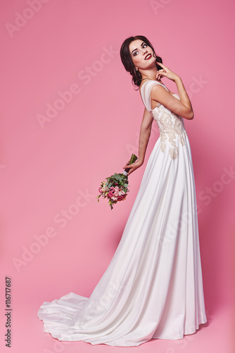 Beautiful bride in a luxurious wedding dress