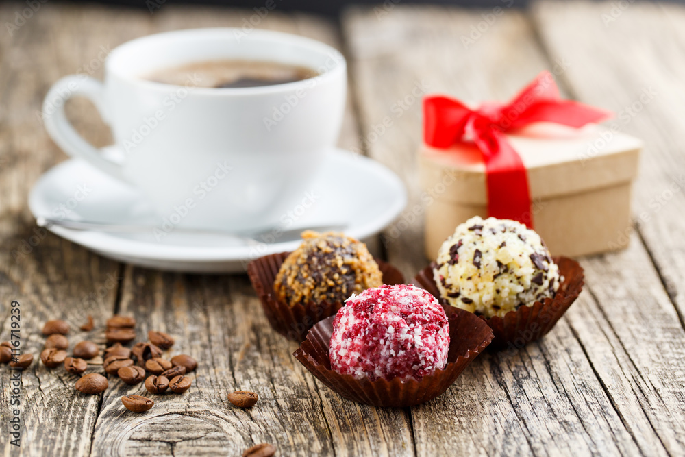 Delicious vegetarian truffle candies on wodden table. Delicious vegetarian truffle candies on wodden table.