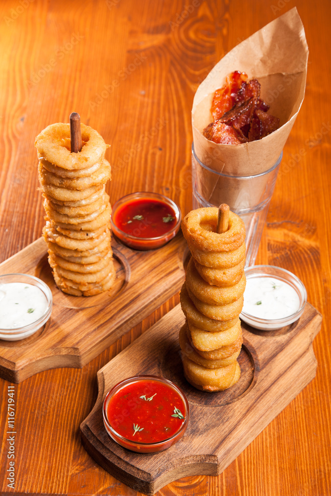 snacks to beer on a wooden table