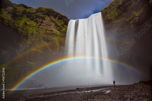 Double rainbow over skogafoss waterfall, iceland
