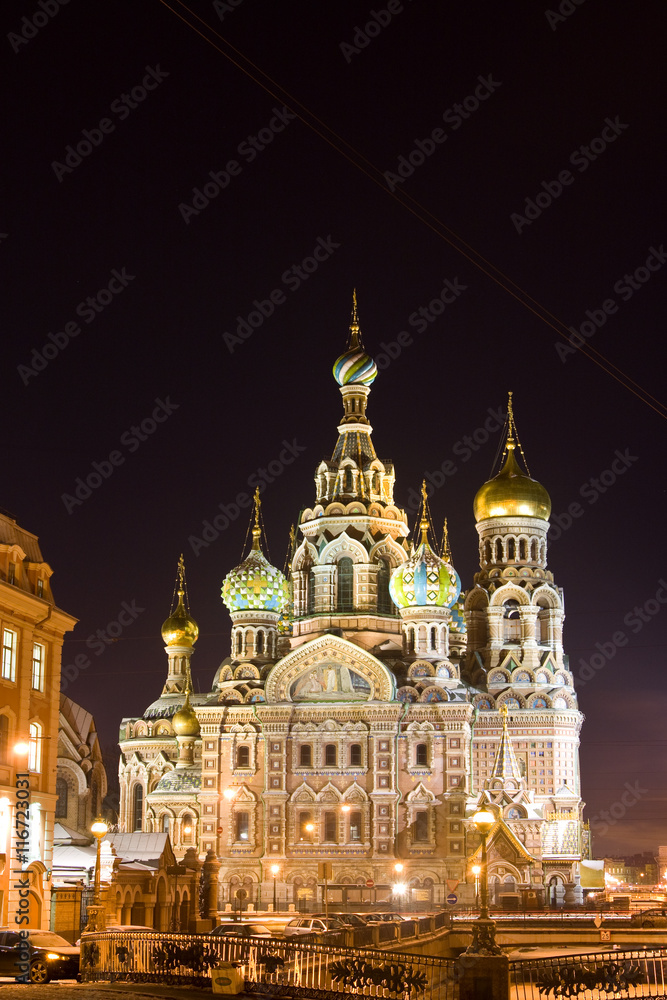 The church by the canal. White nights, Saint-Petersburg, Russia..Night view of Griboyedov Canal and Church of the Savior on Blood. The church by the canal. White nights, Saint-Petersburg, Russia..Night view of Griboyedov Canal and Church of the Savior on Blood.