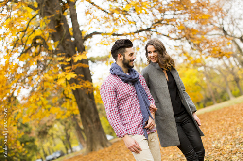 Young couple in the autumn park