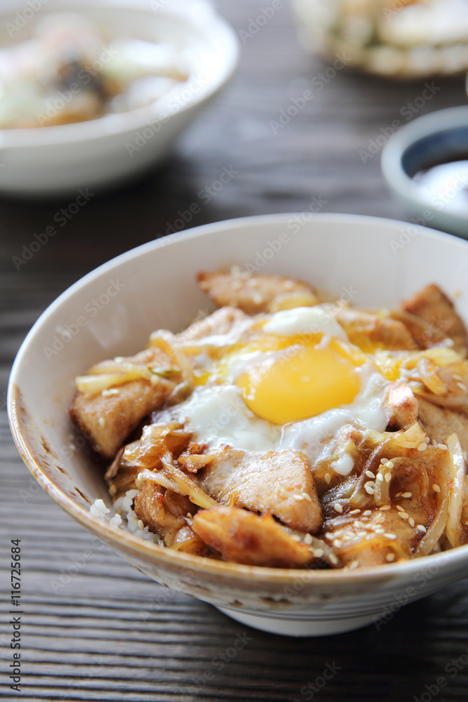 rice with slice pork and egg butadon - japanese food