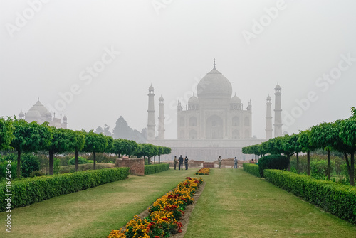 Taj Mahal view in morning fog from across the Mehtab Bagh or The Moonlight Garden, Agra, India
