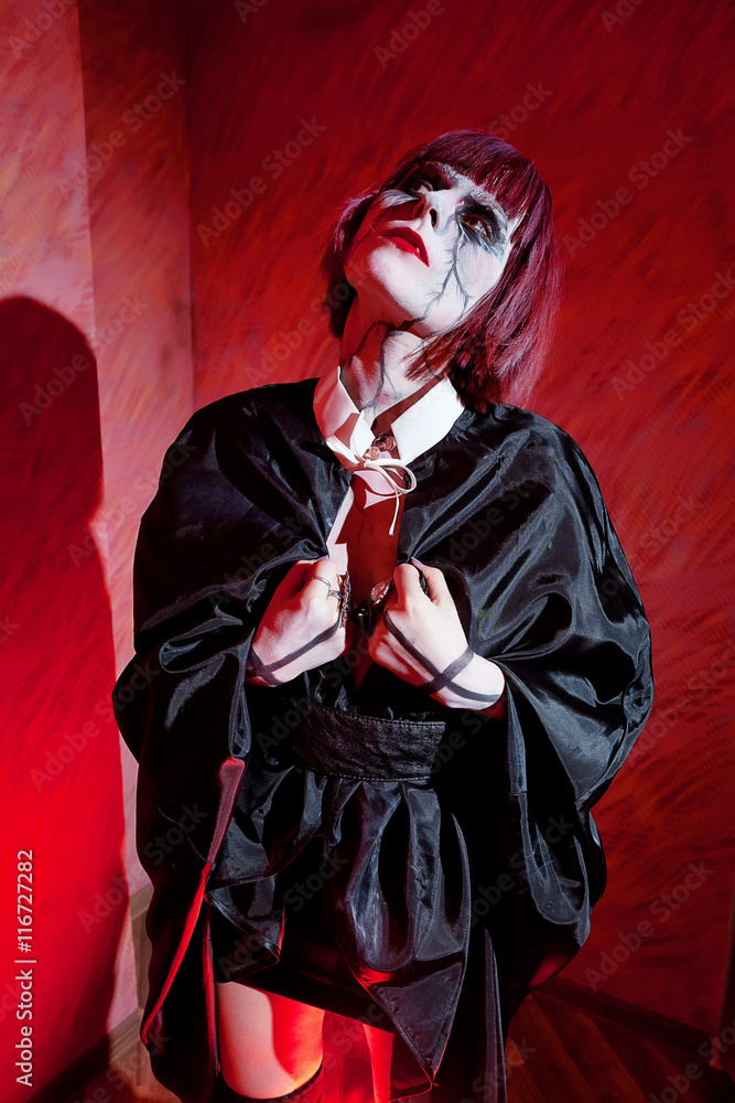 zombie girl in black Kim looks up on red zombie girl in black Kim looks up on red