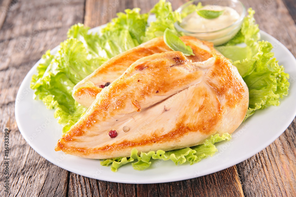 fried chicken breast and salad