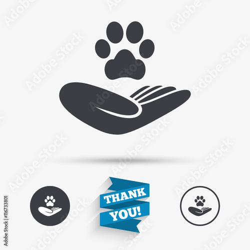 Shelter pets sign icon. Hand holds paw symbol.