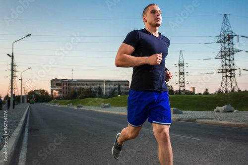 Close-up portrait of athletic man running