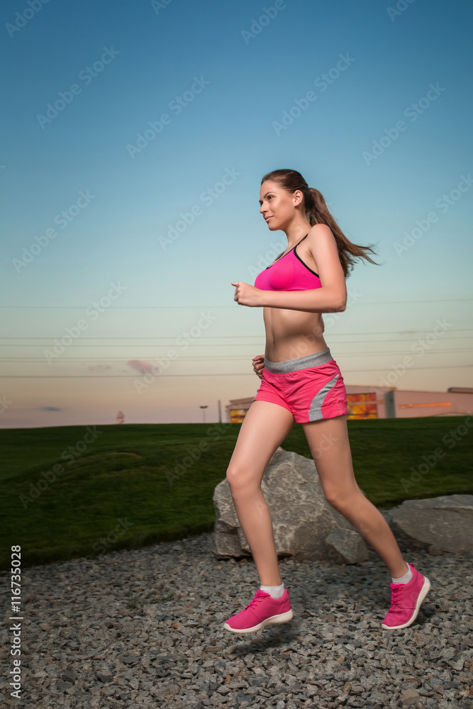 Running woman. Runner jogging in sunny nature. Running woman. Runner jogging in sunny nature.