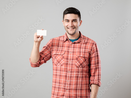 Man showing blank business card