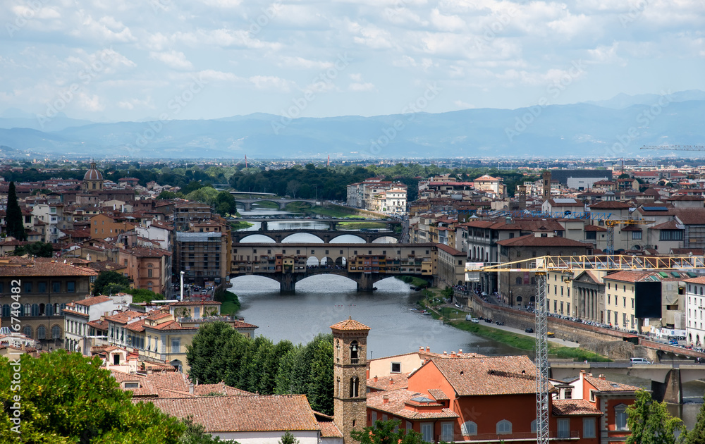 Medieval stone bridge Ponte Vecchio over the Arno River, Florenc