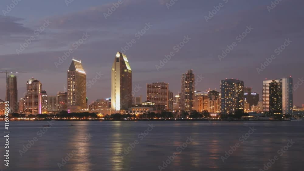 Time Lapse of downtown San Diego as the sun sets with reflections of the buildings in the water. Time Lapse of downtown San Diego as the sun sets with reflections of the buildings in the water.