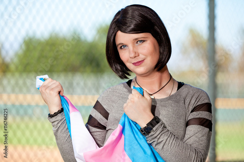 Cuadro en lienzo Transgender girl holding Trans Pride flag.