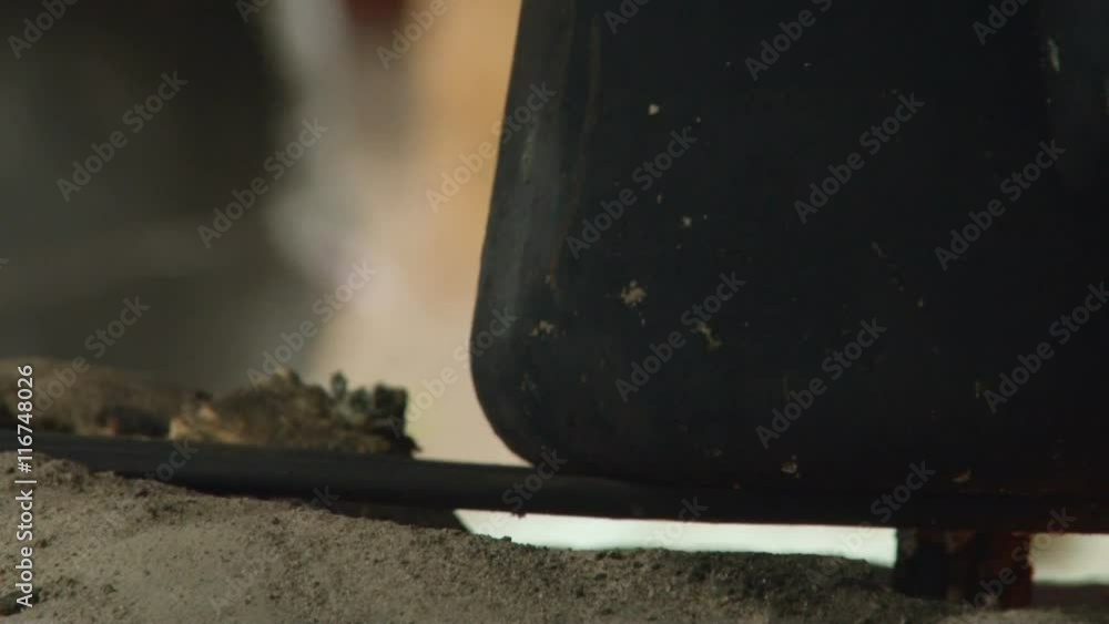 Utensils on Fire. Kitchen Outdoors. Metal Tableware. Fire in the Furnace. Closeup Utensils on Fire. Kitchen Outdoors. Metal Tableware. Fire in the Furnace. Closeup