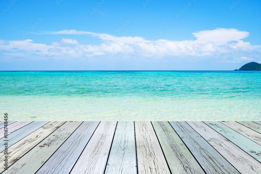 Empty wooden on sea beach emerald colorful