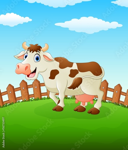 Happy cow cartoon on the field