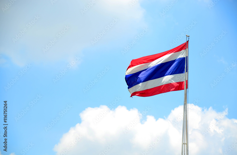 Thai flag against blue sky Thai flag against blue sky