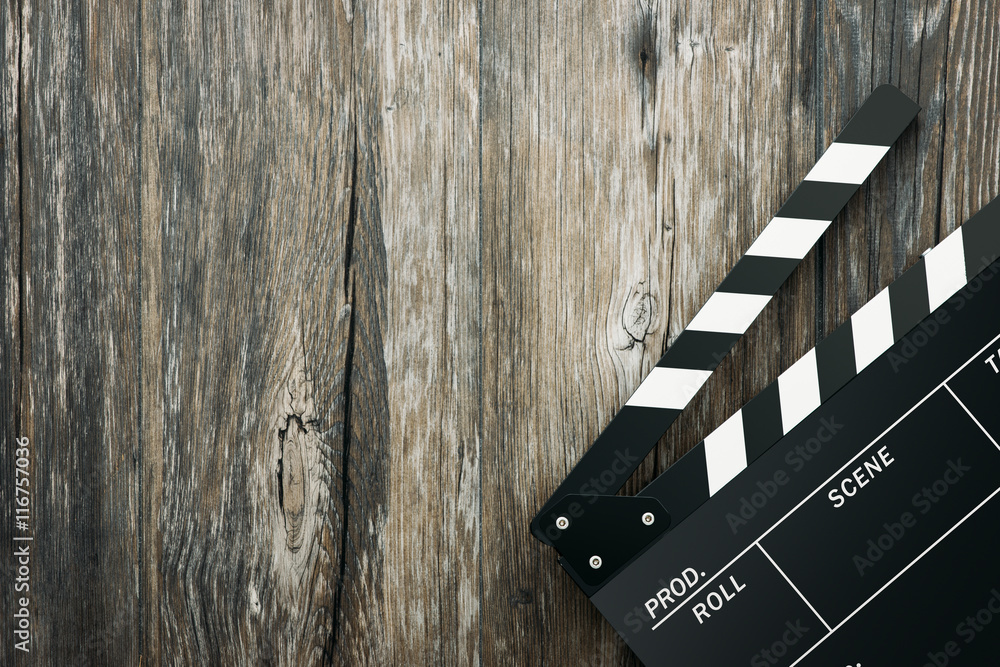 Naklejka premium Clapper board on wood