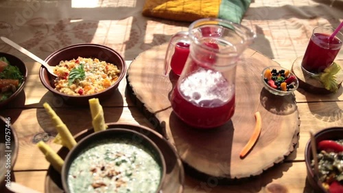 Closeup of vegetarian food on rustic wooden table