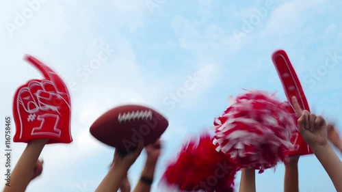 Tailgate: Group Of Fans Cheer Against Blue Sky