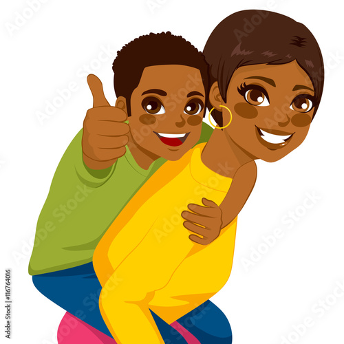 Beautiful african american brunette young mother with her son on piggyback ride smiling happy together