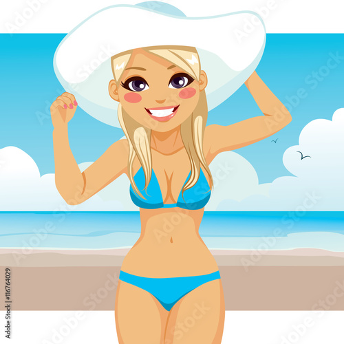 Beautiful blonde woman wearing blue bikini and big white hat standing on tropical beach