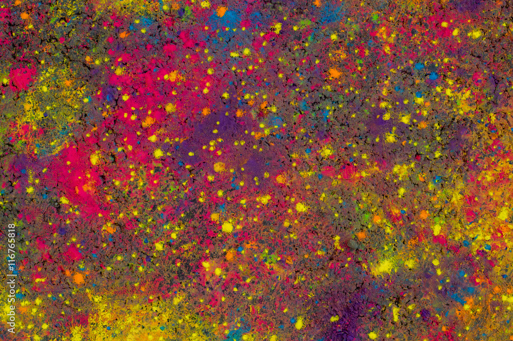 Multicolored dry paint on the asphalt Multicolored dry paint on the asphalt