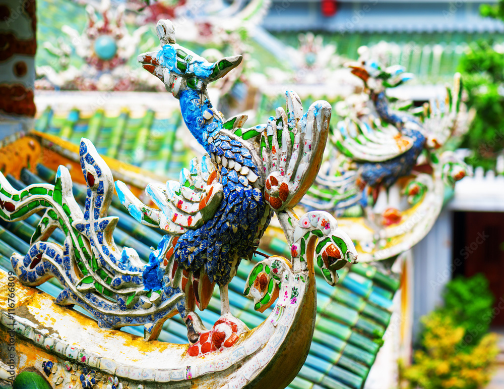Traditional colorful mosaic roof detail at the Linh Ung Pagoda