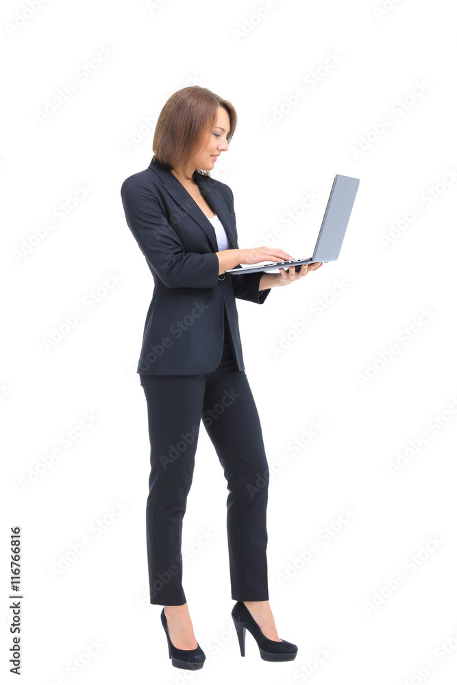 Beautiful businesswoman keeps the laptop. Beautiful businesswoman keeps the laptop.